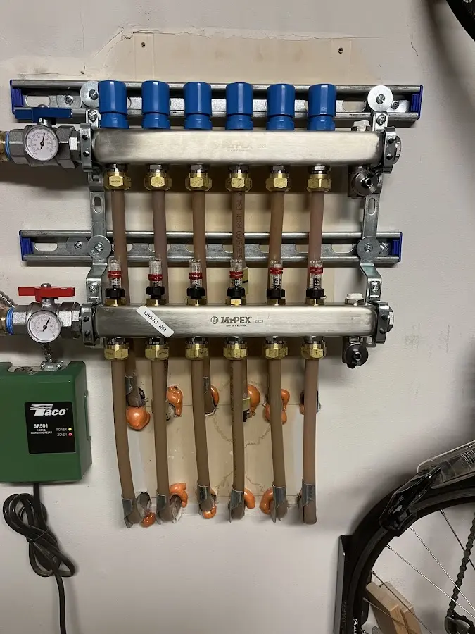 Plumber performing Gas Line Installation at a residential property in East Aurora